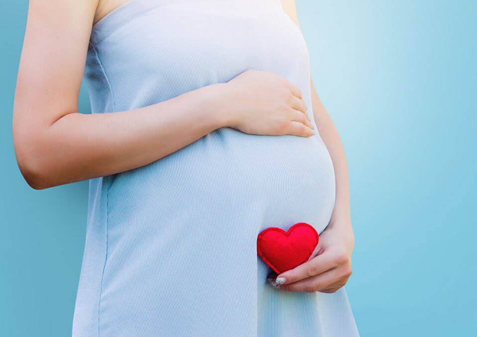 fat pregnant woman surrounded by hearts 1